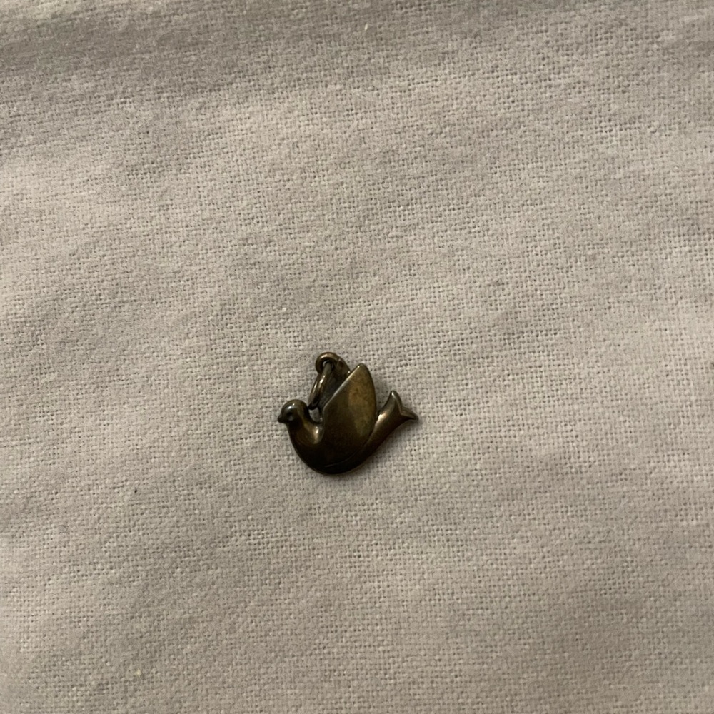 Retired James Avery dove charm